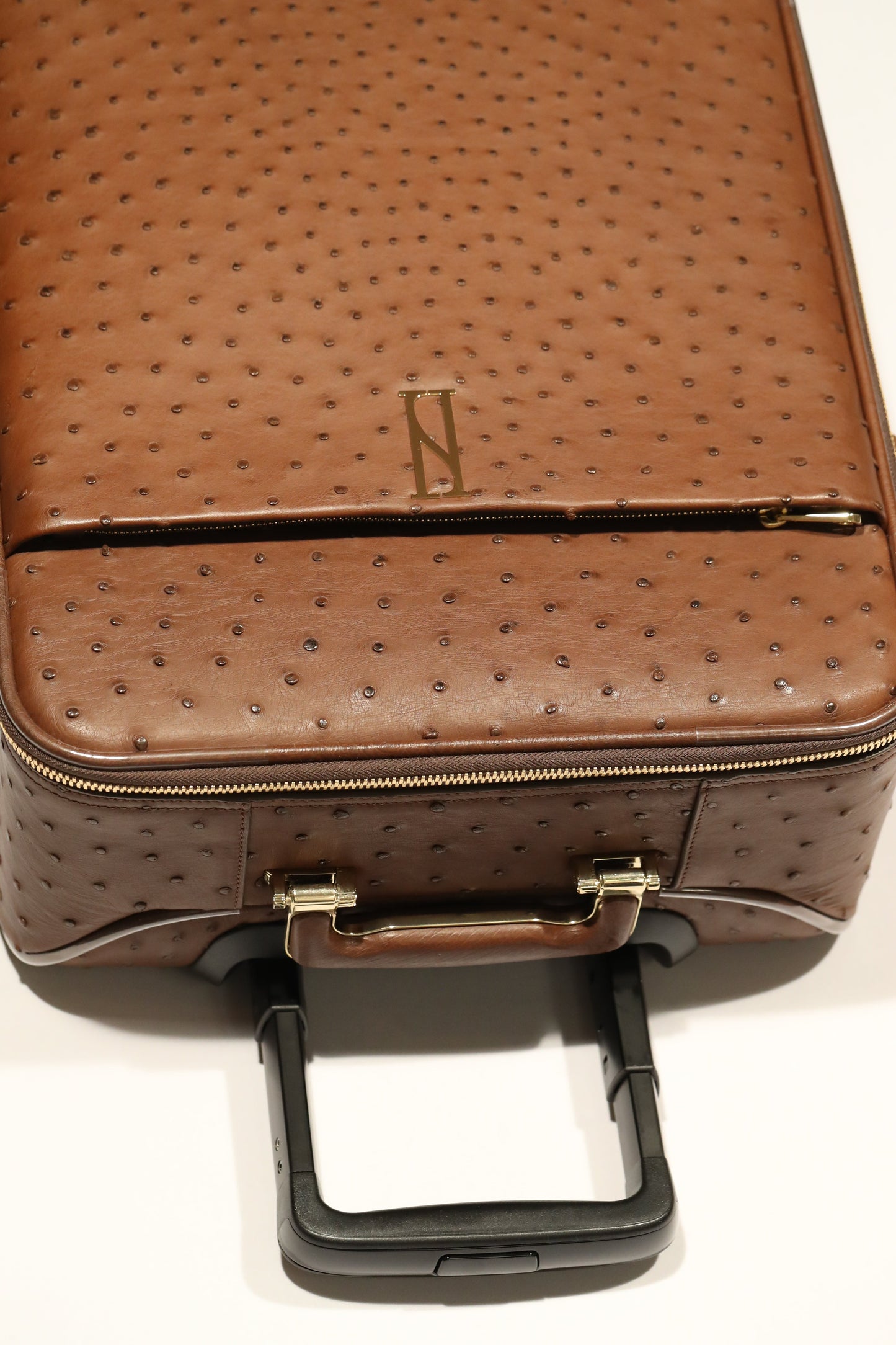 LEADER luggage in BROWN